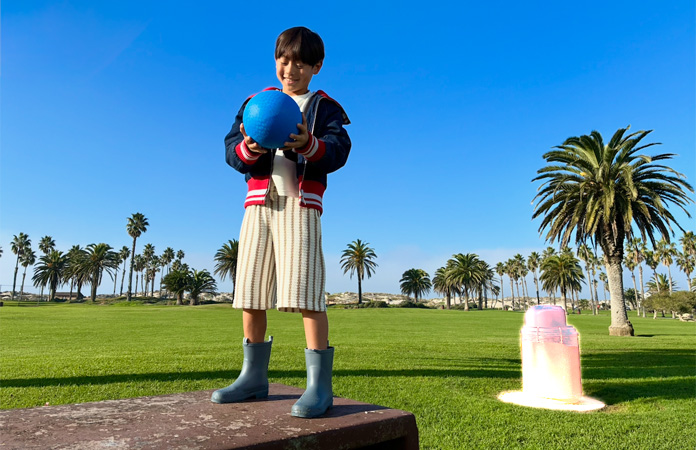 Clean Up tool in use, highlighting a trash can to be removed from the background of a photo