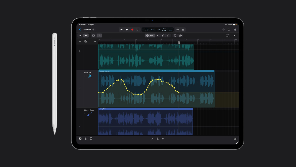 iPad Pro 13″ screen workspace showing drawing over the sound wave in Logic Pro, Apple Pencil to the left of device