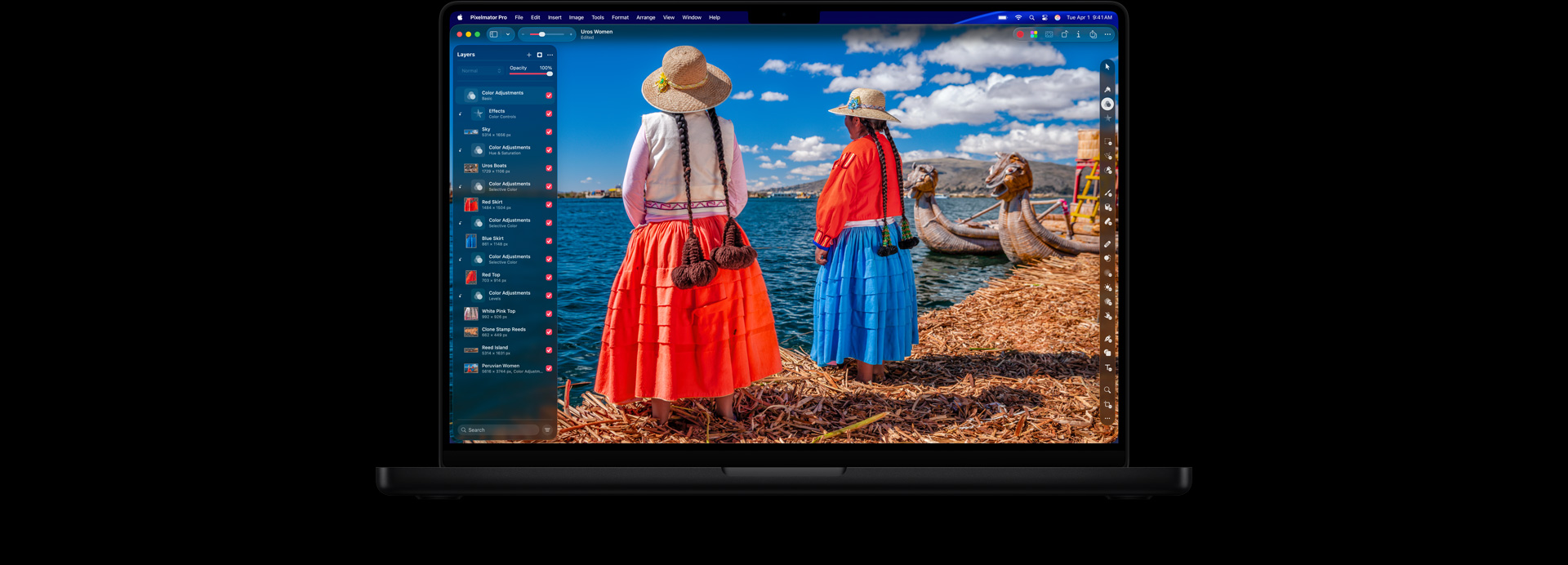 MacBook Pro 16″ screen, photo of two women in brightly coloured outfits, colour editing tools